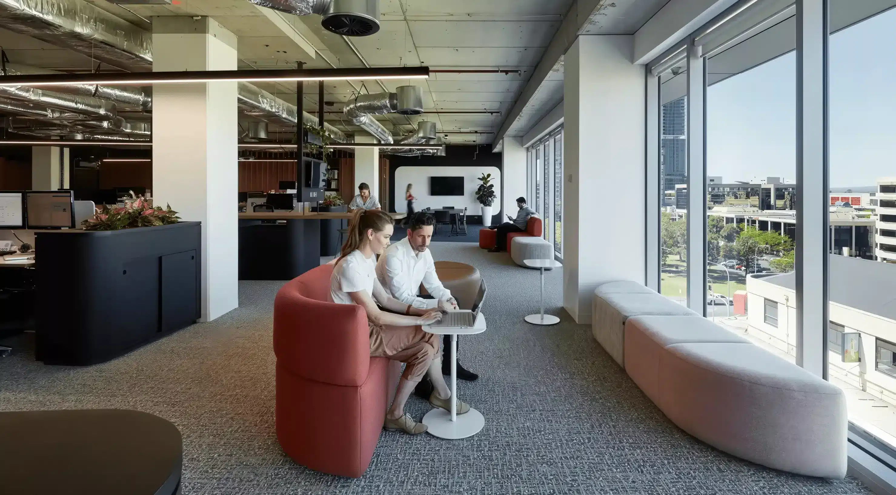 DesignInc Adelaide Office employees sitting on the Bauahaus collection by Helen Kontouris